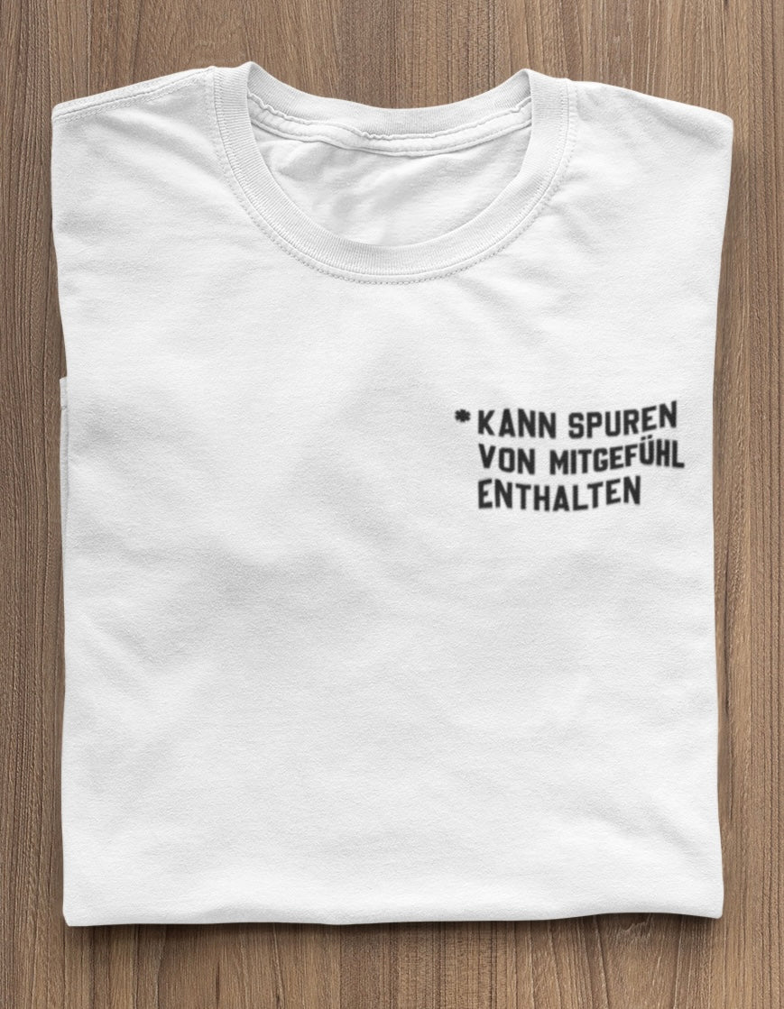 Kann Spuren von Mitgefühl enthalten - Premium Shirt